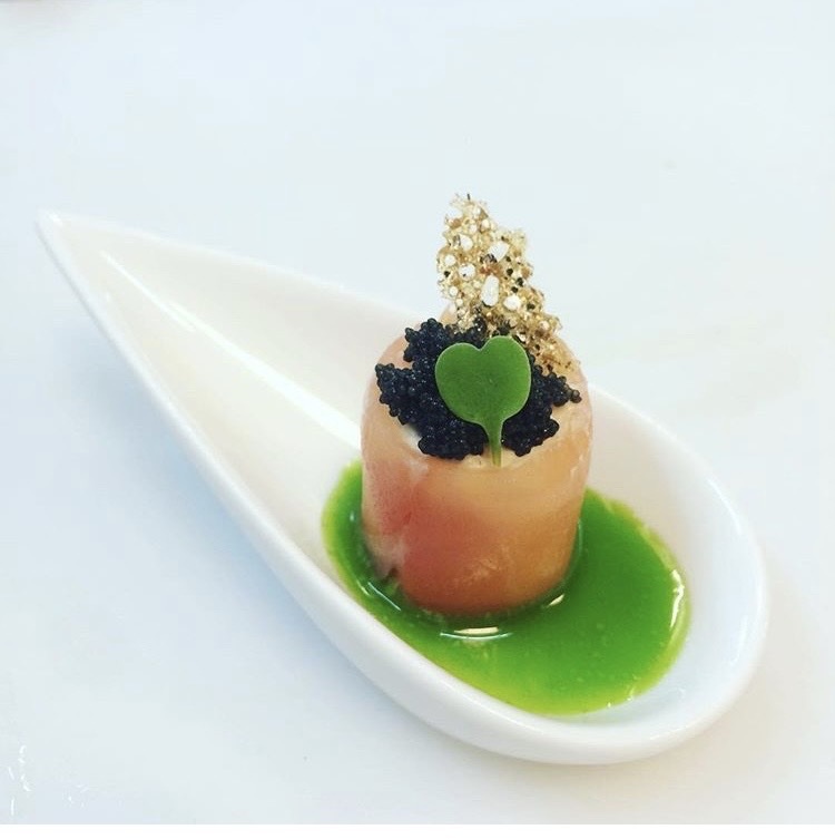 Smoked Salmon Roll with Caviar and basil oil
